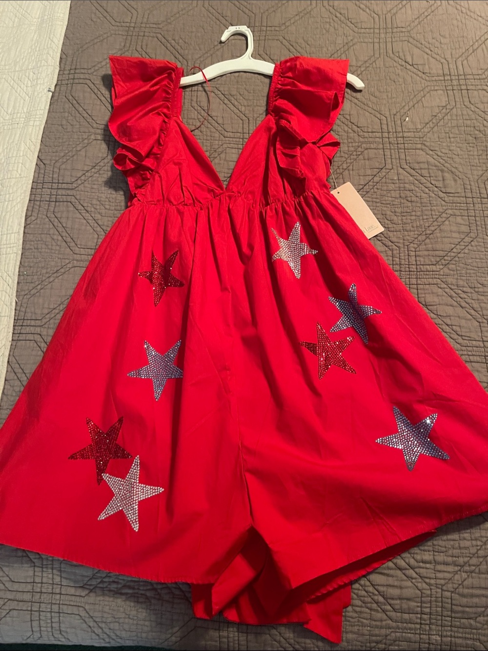 Woman’s Red Ruffle Strap skort/dress with Star Accents.